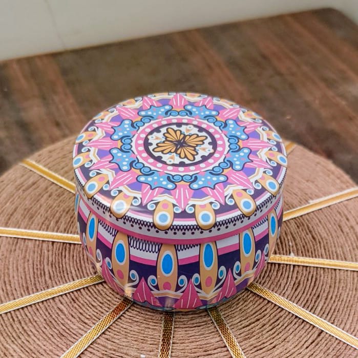 Natural soy wax candle in a decorative mandala tin jar with lid beside it, placed on a rustic mat, Soy wax candle, Vegan Candle, Nita Kreations, Home Decor, Premium Candles, Festive Season, Good quality Candles, Scented Candles, Vanilla Scented Candles, Aesthetic Home Decor, Aesthetic Candle