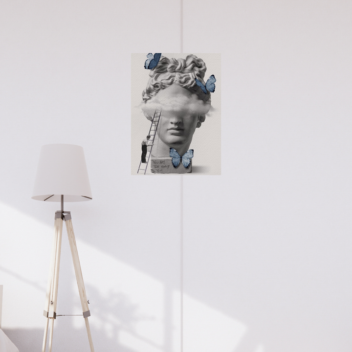 Poster showing a surreal Greek bust with clouds obscuring the eyes, blue butterflies around, and a handwritten message “You are the only you” at the base. Aesthetic Poster, Greek style poster, Hostel dorm decor ideas,Room decor, Home decor ideas, posters, Poster.