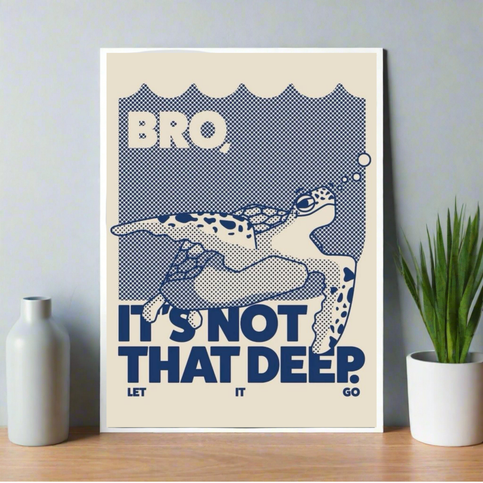 Poster with a sea turtle and the quote “Bro, It’s Not That Deep. Let It Go” in bold navy text with halftone dot illustration.