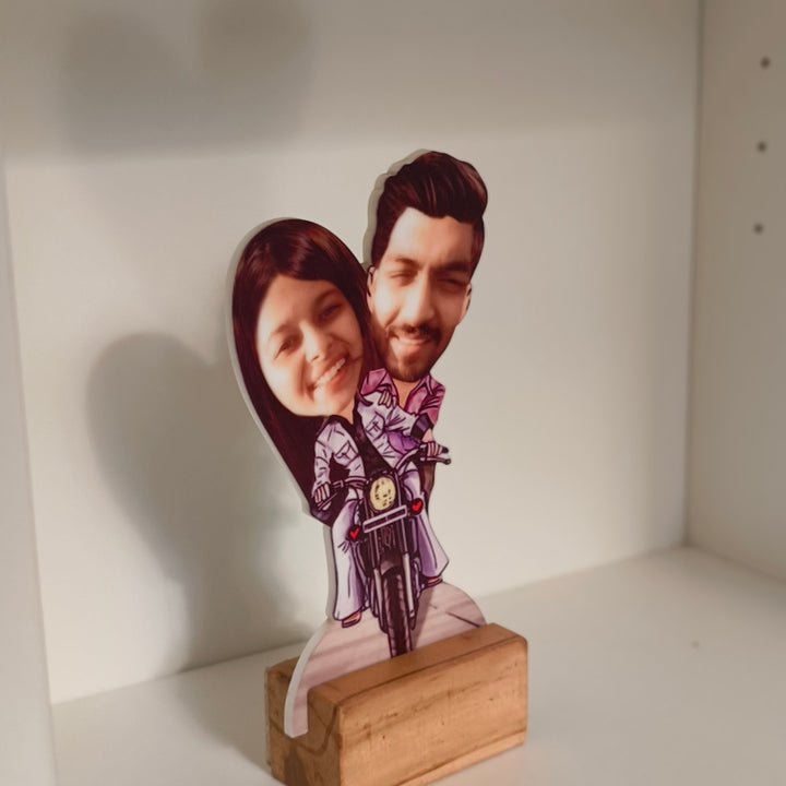 Cute caricature of a smiling couple riding a motorcycle, with their real faces on illustrated cartoon bodies wearing matching outfits, labeled “Partners Forever.” Caricature, gifting ideas, personalized gifting, custom gifts, couple gift, anniversary gift