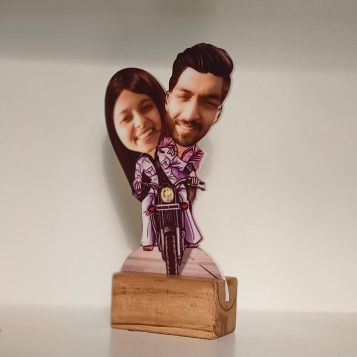 Cute caricature of a smiling couple riding a motorcycle, with their real faces on illustrated cartoon bodies wearing matching outfits, labeled “Partners Forever.” Caricature, gifting ideas, personalized gifting, custom gifts, couple gift, anniversary gift