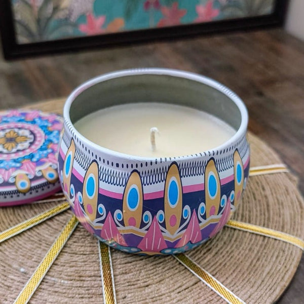 Natural soy wax candle in a decorative mandala tin jar with lid beside it, placed on a rustic mat, Soy wax candle, Vegan Candle, Nita Kreations, Home Decor, Premium Candles, Festive Season, Good quality Candles, Miniso Candles, Scented Candles, Vanilla Scented Candles, Aesthetic Home Decor, Aesthetic Candle, Jo malone, BBW candle, Bath & body works
