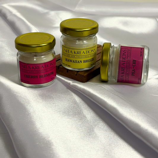 Pack of 3 mini soy wax candles featuring Hawaiian Breeze, Pea-chi and Cherry Blossom fragrances, named Soft Summer Hours.