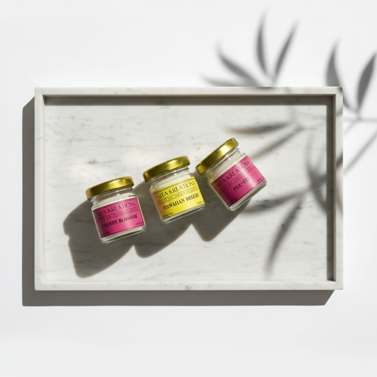 Pack of 3 mini soy wax candles featuring Hawaiian Breeze, Pea-chi and Cherry Blossom fragrances, named Soft Summer Hours.