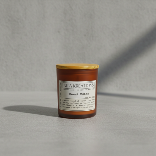 Soy wax candle in amber jar with wooden lid, Sweet Ember fragrance with caramelized vanilla and toasted tonka.